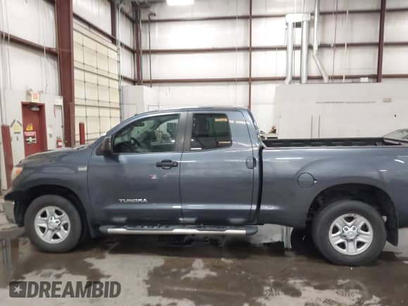 2008 Toyota Tundra z VIN 5TFRT54198X023567, wystawiony jako IAAI lot #43289726 z przebiegiem 185 308 mil mil oraz . Historia ofert i sprzedaży dostępna na DreamBid. Obrazek 14.