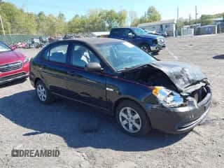 2010 Hyundai Accent GLS z VIN KMHCN4AC7AU404868, wystawiony jako IAAI lot #43352092 z przebiegiem 120 247 mil mil oraz . Historia ofert i sprzedaży dostępna na DreamBid. Obrazek 1.