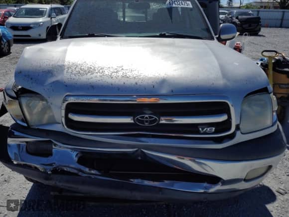 2000 Toyota Tundra SR5 z VIN 5TBRT3419YS003824, wystawiony jako Copart lot #87432475 z przebiegiem Nie podano mil oraz Szkoda całkowita • Salvage title. Historia ofert i sprzedaży dostępna na DreamBid. Obrazek 12.