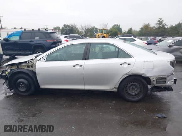 2014 Toyota Camry LE with VIN 4T4BF1FK4ER401493, listed as a IAAI auction lot 43303455 with 183,665 mi miles and . Bid and sale history available at DreamBid. Image 14.