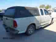 1999 Ford F-150 with VIN 1FTRX17W0XKB32371, listed as a IAAI auction lot 43457398 with Not provided miles and . Bid and sale history available at DreamBid. Image 4.