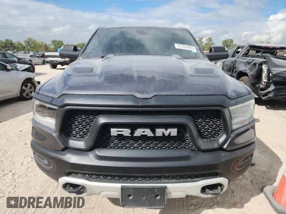 2019 Ram 1500 Rebel z VIN 1C6SRFET7KN871348, wystawiony jako Copart lot #85364805 z przebiegiem 138 362 mil mil oraz Czysty tytuł • Clean title. Historia ofert i sprzedaży dostępna na DreamBid. Obrazek 5.