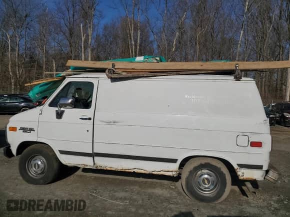 1995 Chevrolet Chevy Van with VIN 1GCEG25Z1SF202088, listed as a Copart auction lot 44373315 with 184,821 mi miles and Salvage title. Bid and sale history available at DreamBid. Image 2.