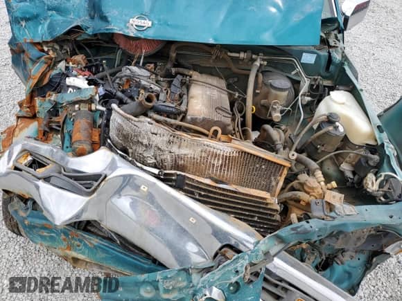 1995 Nissan Frontier z VIN 1N6SD11S4SC459520, wystawiony jako Copart lot #62758145 z przebiegiem Nie podano mil oraz Nie do naprawy • Non repairable. Historia ofert i sprzedaży dostępna na DreamBid. Obrazek 11.