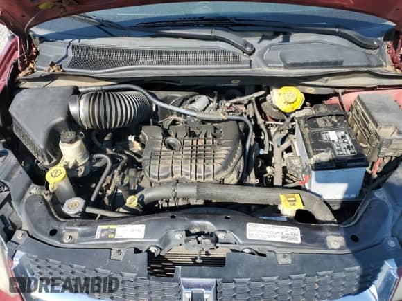 2014 Dodge Grand Caravan American Value with VIN 2C4RDGBG1ER163297, listed as a Copart auction lot 81726835 with 188,781 mi miles and Salvage title. Bid and sale history available at DreamBid. Image 12.