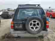 2000 Chevrolet Tracker with VIN 2CNBJ13C8Y6955130, listed as a Copart auction lot 89112385 with 289,680 mi miles and Salvage title. Bid and sale history available at DreamBid. Image 6.