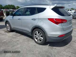 2014 Hyundai Santa Fe with VIN 5XYZU3LA3EG206433, listed as a IAAI auction lot 43409449 with 160,278 mi miles and . Bid and sale history available at DreamBid. Image 3.