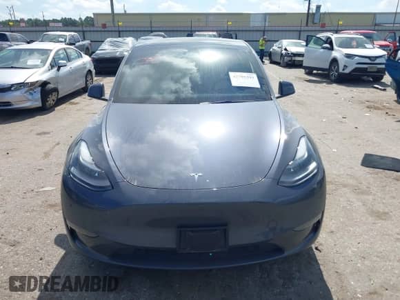 2023 Tesla Model Y Long Range with VIN 7SAYGDEE8PA163534, listed as a IAAI auction lot 42795393 with 45,172 mi miles and . Bid and sale history available at DreamBid. Image 11.