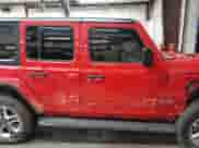 2022 Jeep Wrangler Unlimited Sahara Altitude with VIN 1C4HJXEG8NW124892, listed as a IAAI auction lot 42615986 with 23,630 mi miles and . Bid and sale history available at DreamBid. Image 13.