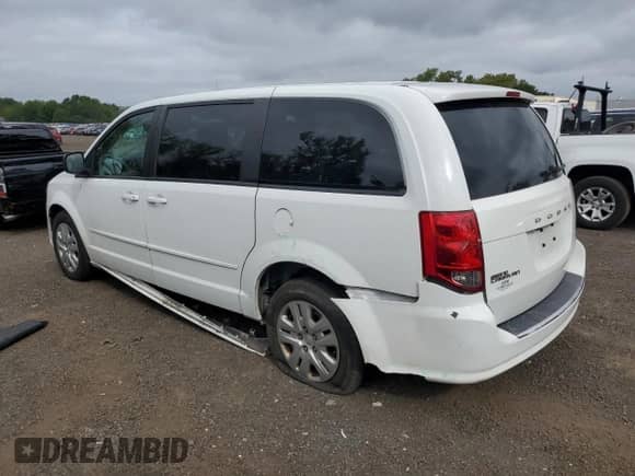 2017 Dodge Grand Caravan SE with VIN 2C4RDGBGXHR648641, listed as a Copart auction lot 68714615 with 153,290 mi miles and Salvage title. Bid and sale history available at DreamBid. Image 2.