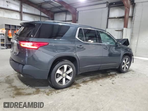 2020 Chevrolet Traverse LT с VIN 1GNEVHKW0LJ215780, выставлен на аукционе Copart как лот 71681455 с пробегом 96 838 миль миль и Списание • Salvage title. История ставок и продаж доступна на DreamBid. Изображение 3.