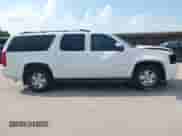 2012 Chevrolet Suburban LT z VIN 1GNSCJE03CR272306, wystawiony jako IAAI lot #43038425 z przebiegiem 193 430 mil mil oraz . Historia ofert i sprzedaży dostępna na DreamBid. Obrazek 14.