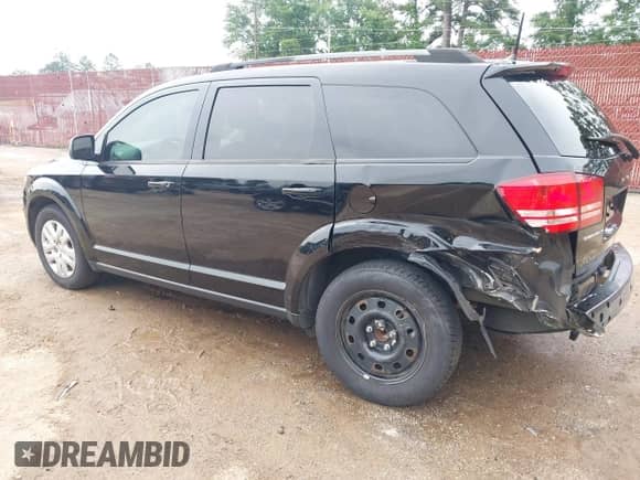 2019 Dodge Journey SE Value with VIN 3C4PDCAB8KT758646, listed as a IAAI auction lot 42351939 with 129,606 mi miles and . Bid and sale history available at DreamBid. Image 3.
