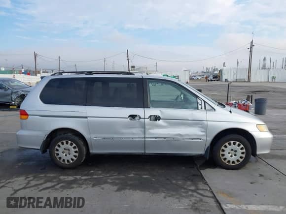 2004 Honda Odyssey LX with VIN 5FNRL18524B042391, listed as a IAAI auction lot 43280655 with 165,252 mi miles and . Bid and sale history available at DreamBid. Image 14.