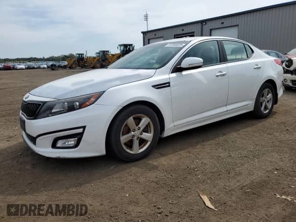2015 Kia Optima LX z VIN 5XXGM4A7XFG361703, wystawiony jako Copart lot #81389025 z przebiegiem 170 881 mil mil oraz Czysty tytuł • Clean title. Historia ofert i sprzedaży dostępna na DreamBid. Obrazek 1.