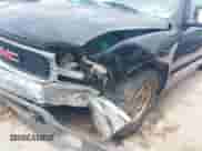 2000 GMC Sierra 1500 SLE z VIN 1GTEC19T4YZ292226, wystawiony jako IAAI lot #42989644 z przebiegiem Nie podano mil oraz . Historia ofert i sprzedaży dostępna na DreamBid. Obrazek 6.