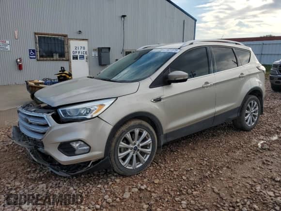 2017 Ford Escape Titanium with VIN 1FMCU9J91HUD60350, listed as a Copart auction lot 67822375 with 149,446 mi miles and Salvage title. Bid and sale history available at DreamBid. Image 1.