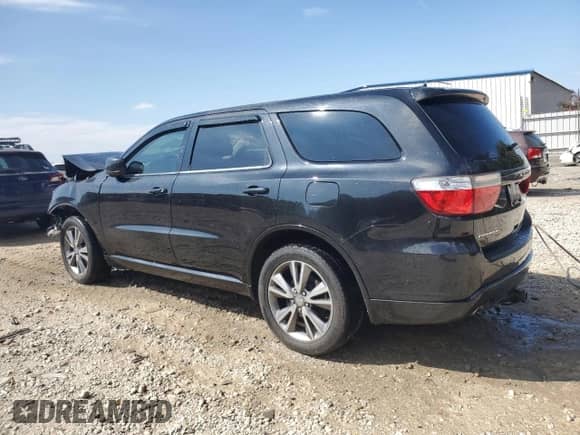 2013 Dodge Durango SXT with VIN 1C4RDHAG4DC662092, listed as a Copart auction lot 71425135 with 169,603 mi miles and Salvage title. Bid and sale history available at DreamBid. Image 2.