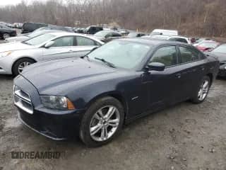 2012 Dodge Charger RT Max with VIN 2C3CDXDT8CH306169, listed as a Copart auction lot 83318144 with 126,403 mi miles and Salvage title. Bid and sale history available at DreamBid. Image 1.