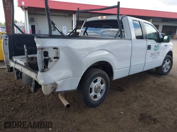 2009 Ford F-150 STX with VIN 1FTRX12849FA63821, listed as a IAAI auction lot 42164385 with 199,882 mi miles and . Bid and sale history available at DreamBid. Image 4.