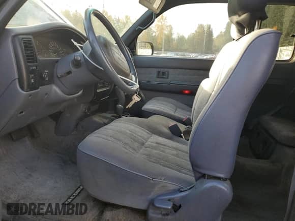 2000 Toyota Tacoma with VIN 5TEWN72N3YZ700698, listed as a Copart auction lot 90316805 with 176,401 mi miles and Salvage title. Bid and sale history available at DreamBid. Image 7.