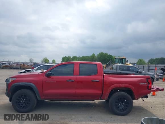 2023 Chevrolet Colorado 4WD Trail Boss с VIN 1GCPTEEK1P1201410, выставлен на аукционе IAAI как лот 39219863 с пробегом 12 420 миль миль и . История ставок и продаж доступна на DreamBid. Изображение 15.
