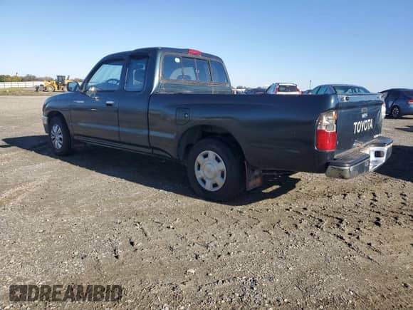 1997 Toyota Tacoma with VIN 4TAVL52N7VZ330736, listed as a Copart auction lot 82432415 with 376,229 mi miles and Salvage title. Bid and sale history available at DreamBid. Image 2.