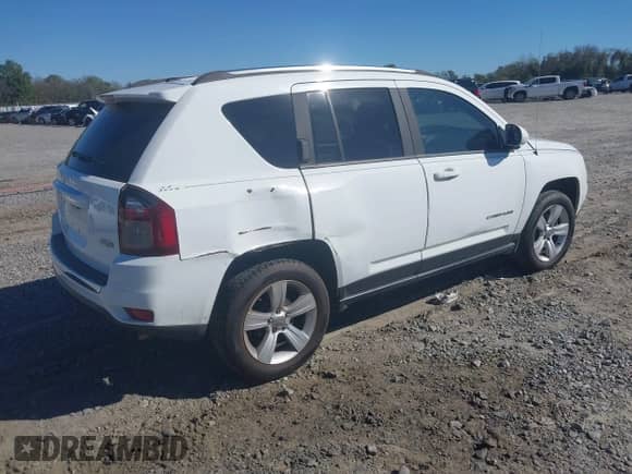 2015 Jeep Compass High Altitude with VIN 1C4NJCEA8FD210935, listed as a IAAI auction lot 43526780 with 195,054 mi miles and . Bid and sale history available at DreamBid. Image 4.