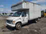 2002 Ford Econoline Cargo с VIN 1FDSE35L12HA81850, выставлен на аукционе Copart как лот 59160315 с пробегом 74 773 миль миль и Чистый • Clean title. История ставок и продаж доступна на DreamBid. Изображение 1.