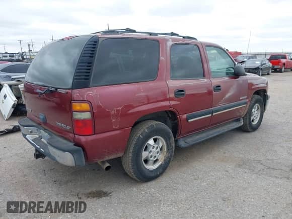 2001 Chevrolet Tahoe LS with VIN 1GNEK13T81J242596, listed as a IAAI auction lot 42177221 with 172,971 mi miles and . Bid and sale history available at DreamBid. Image 4.