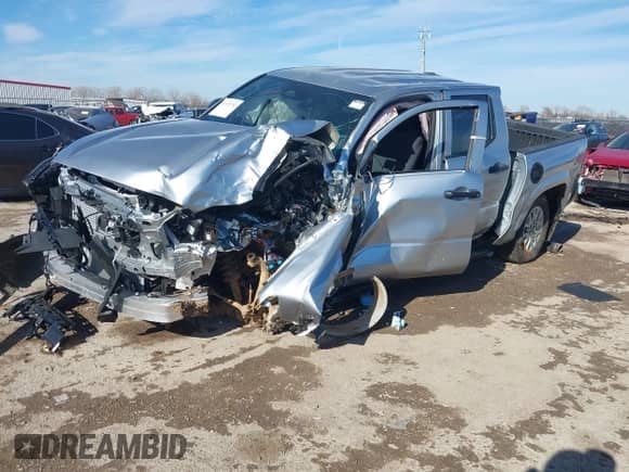 2024 Toyota Tacoma SR with VIN 3TYKD5HN4RT016047, listed as a IAAI auction lot 41335702 with Not provided miles and . Bid and sale history available at DreamBid. Image 2.