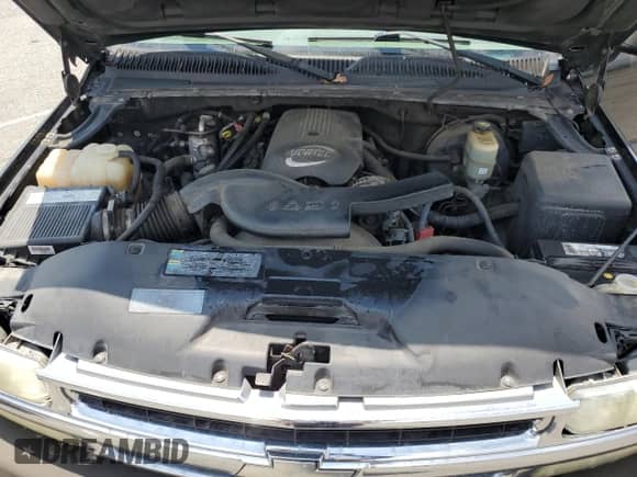 2002 Chevrolet Tahoe LS with VIN 1GNEC13T52R290024, listed as a Copart auction lot 65583635 with 154,333 mi miles and Salvage title. Bid and sale history available at DreamBid. Image 12.