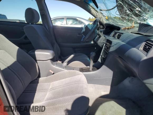 2000 Toyota Camry LE с VIN 4T1BF22KXYU100222, выставлен на аукционе Copart как лот 86111955 с пробегом Не указан миль и Списание • Salvage title. История ставок и продаж доступна на DreamBid. Изображение 7.