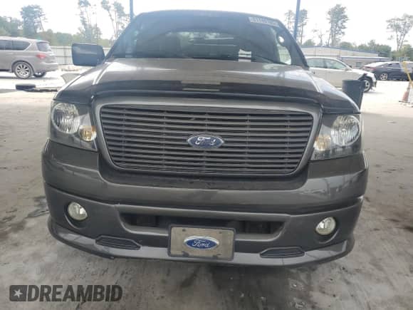 2007 Ford F-150 XL with VIN 1FTPX12V97KC08577, listed as a Copart auction lot 81140185 with 145,568 mi miles and Salvage title. Bid and sale history available at DreamBid. Image 5.