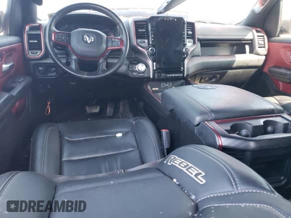 2023 Ram 1500 Rebel with VIN 1C6SRFLT5PN590742, listed as a Copart auction lot 68480204 with Not provided miles and Salvage title. Bid and sale history available at DreamBid. Image 8.