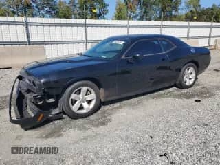 2014 Dodge Challenger SXT z VIN 2C3CDYAG5EH229969, wystawiony jako Copart lot #85288785 z przebiegiem 194 859 mil mil oraz Szkoda całkowita • Salvage title. Historia ofert i sprzedaży dostępna na DreamBid. Obrazek 1.