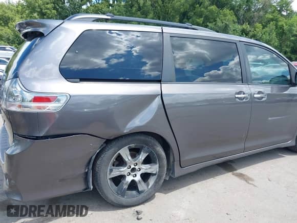 2014 Toyota Sienna SE with VIN 5TDXK3DC8ES443113, listed as a IAAI auction lot 42735795 with 235,269 mi miles and . Bid and sale history available at DreamBid. Image 6.