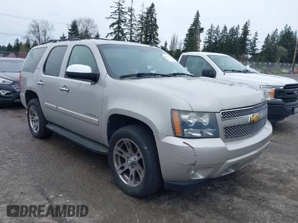 2007 Chevrolet Tahoe LTZ z VIN 1GNFK13047J373205, wystawiony jako IAAI lot #41830747 z przebiegiem 182 361 mil mil oraz . Historia ofert i sprzedaży dostępna na DreamBid. Obrazek 1.