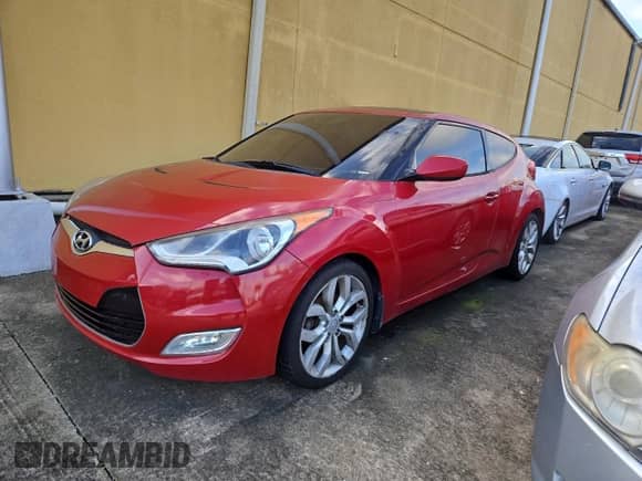 2015 Hyundai Veloster z VIN KMHTC6AD0FU238274, wystawiony jako Copart lot #82464584 z przebiegiem 14 312 mil mil oraz Czysty tytuł • Clean title. Historia ofert i sprzedaży dostępna na DreamBid. Obrazek 2.