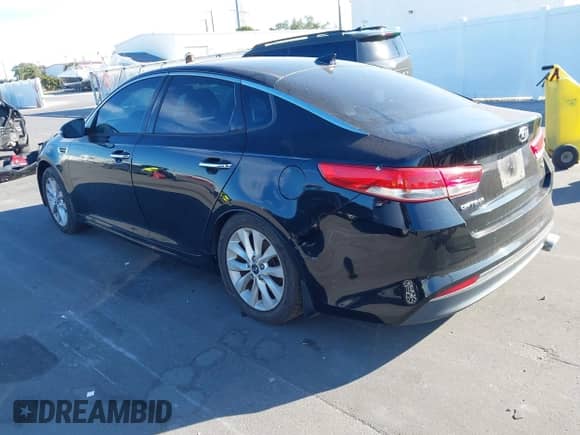 2016 Kia Optima EX with VIN 5XXGU4L33GG053915, listed as a IAAI auction lot 43540697 with 98,283 mi miles and . Bid and sale history available at DreamBid. Image 3.