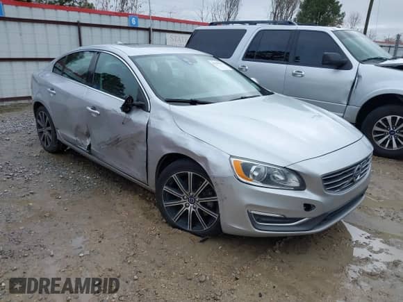 2018 Volvo S60 Inscription z VIN LYV402TKXJB171207, wystawiony jako IAAI lot #41394257 z przebiegiem 102 788 mil mil oraz . Historia ofert i sprzedaży dostępna na DreamBid. Obrazek 1.