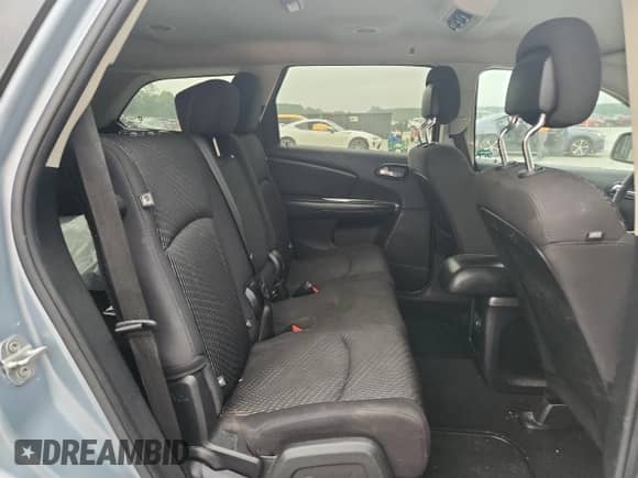 2013 Dodge Journey SXT with VIN 3C4PDCBG4DT581381, listed as a Copart auction lot 69137535 with 155,977 mi miles and Salvage title. Bid and sale history available at DreamBid. Image 11.