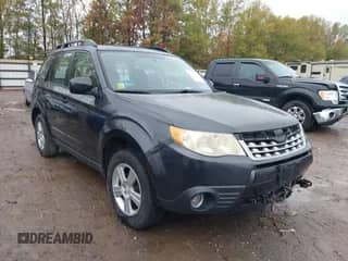 2012 Subaru Forester X z VIN JF2SHABC9CG464917, wystawiony jako IAAI lot #43517197 z przebiegiem 162 536 mil mil oraz . Historia ofert i sprzedaży dostępna na DreamBid. Obrazek 1.