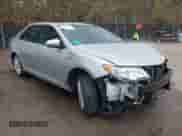 2013 Toyota Camry LE z VIN 4T1BD1FK2DU069763, wystawiony jako IAAI lot #43414989 z przebiegiem 70 738 mil mil oraz . Historia ofert i sprzedaży dostępna na DreamBid. Obrazek 1.