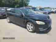 2015 Volvo S60 T5 Drive-E Premier with VIN YV140MFK6F2336518, listed as a Copart auction lot 68339405 with 142,401 mi miles and Salvage title. Bid and sale history available at DreamBid. Image 4.