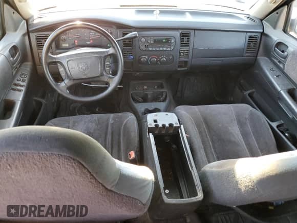 2004 Dodge Dakota Sport z VIN 1D7HL38NX4S789687, wystawiony jako Copart lot #77435824 z przebiegiem 157 993 mil mil oraz Szkoda całkowita • Salvage title. Historia ofert i sprzedaży dostępna na DreamBid. Obrazek 8.