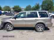 2006 Honda Pilot EX z VIN 5FNYF18426B019092, wystawiony jako IAAI lot #43162613 z przebiegiem 189 862 mil mil oraz . Historia ofert i sprzedaży dostępna na DreamBid. Obrazek 14.