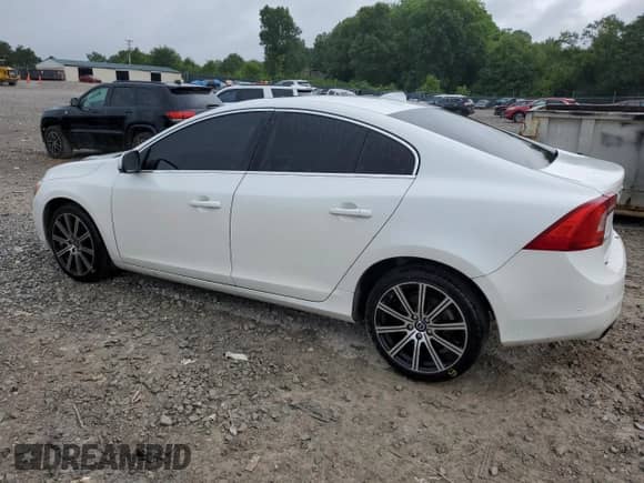 2014 Volvo S60 T5 с VIN YV1612FSXE2289504, выставлен на аукционе Copart как лот 61221985 с пробегом 121 033 миль миль и Списание • Salvage title. История ставок и продаж доступна на DreamBid. Изображение 2.