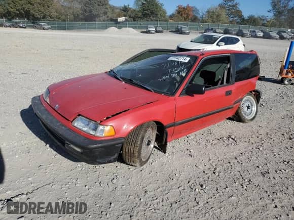 1990 Honda Civic with VIN 2HGED6344LH564439, listed as a Copart auction lot 77142714 with 157,214 mi miles and Salvage title. Bid and sale history available at DreamBid. Image 1.