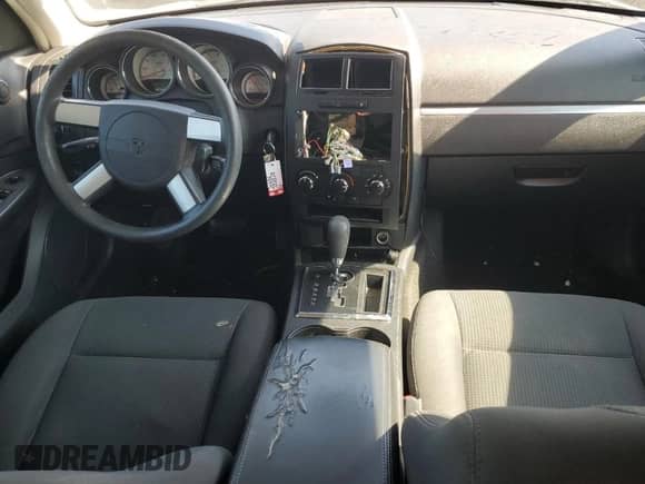 2008 Dodge Charger с VIN 2B3LA43R48H313752, выставлен на аукционе Copart как лот 62012954 с пробегом 187 580 миль миль и Списание • Salvage title. История ставок и продаж доступна на DreamBid. Изображение 8.